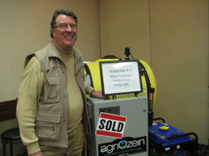 Ernie Wilmink, president of Agriozein with one of  his "ozonators"