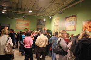  Crowd sampling a wide variety of wine, including St. James Winery who showcased their sweet wines. 