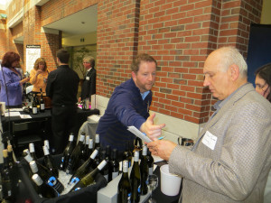 Blake Bernard of Bluestone Vineyards with John Jenna, owner of Vinology Wine Bar and Restaurant in Ann Arbor. Bluestone poured two wine for the first time at the Showcase;  an "11 "naked" Chardonnay and the 2011 Winemakers Red.   The former wine won a Silver Medal at the Pacific Rim Competition and the later wines won a Silver Medal at the Finger Lakes Competition. 