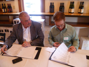 Rick Conney, General Manager of Apache Trout Grill, and Tim Tebeau, Food and Wine Editor of Traverse Magazine, two of the judges at the competition. 