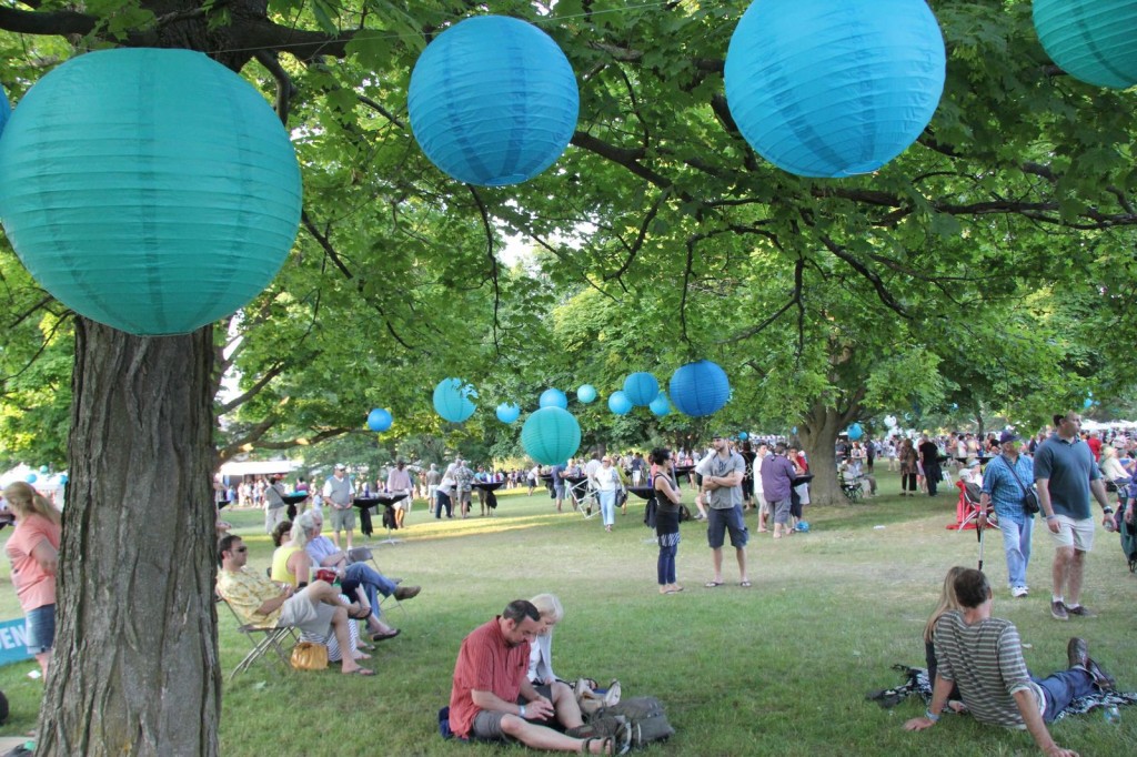 Hundreds of blue globes hung from trees lent an under-the-tent feel to the grounds of the Village at Grand Traverse Grounds as a sell-out crowd of some 5,000 people settled in to listen to musical acts that included Sixto Rodriguez of 'Finding Sugar Man