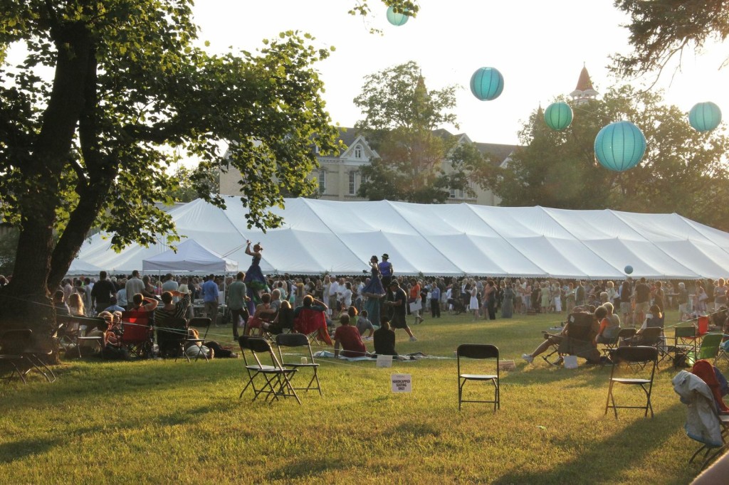 6. The picturesque setting–a massive tent on the grounds of the Village of Grand Traverse Commons–was as much a hit at this year's fifth annual Traverse City Wine & Art Festival as the music acts, great wine and 32 art fair booths. One of the entertainment additions, the 'Amazing Giants