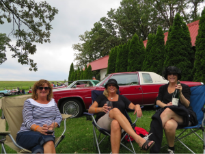 Vicki Jack, Kathy Sommer, and Julie Walker enjoying Botham wines at the Vintage Car show.