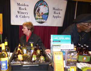 Joan Northhouse and Herdie Baisden(Co-Owner with wife not pictured, Carol Wiersma) sample their wines and ciders from Maiden Rock Winery and Cidery.