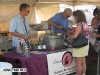 Steve Fricke and Randy Pschigoda pour tastings for visitors at the New Buffalo Harvest and Wine Fest, October 8, 2011.
